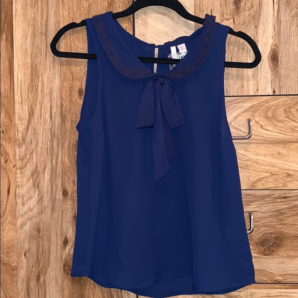 Blue sleeveless top. Lauren Conrad